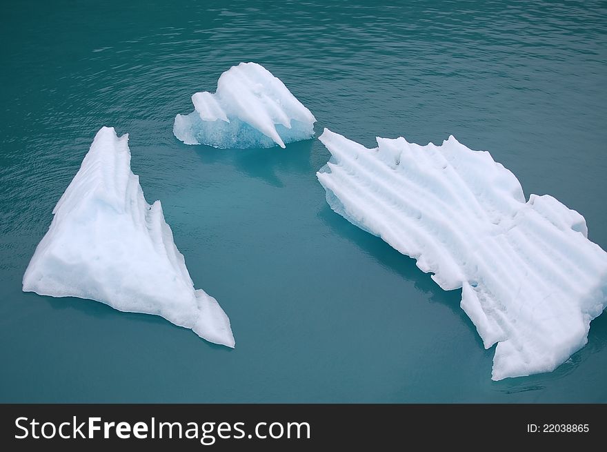 Continental drift, broken icebergs floating in parts. Continental drift, broken icebergs floating in parts