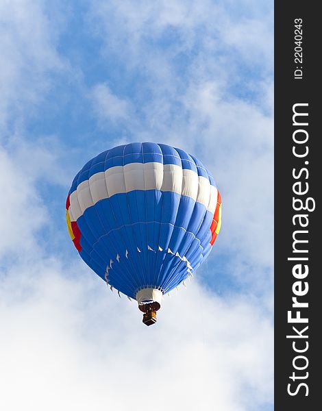 Blue hot balloon up in the blue sky. Balloon Festival, Colorado, USA