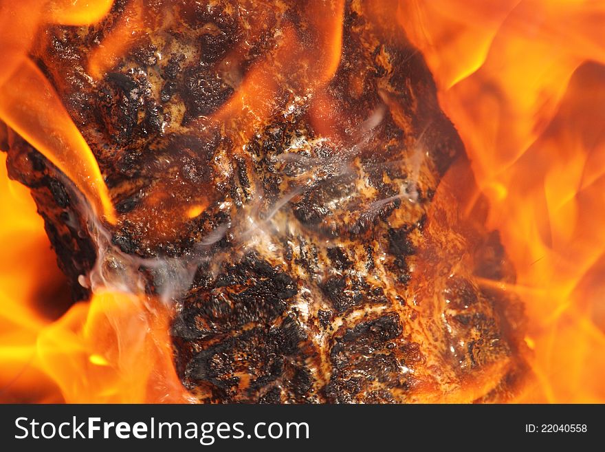 Image of campfire log burning