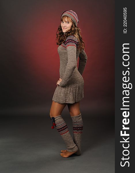 Young Woman In A Woolen Dress