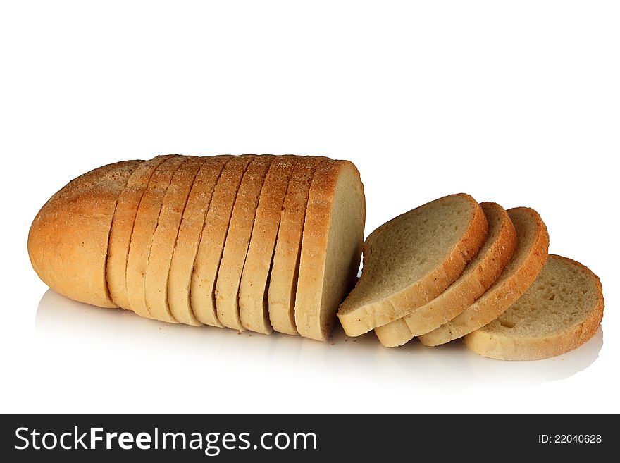 Sliced â€‹â€‹loaf of bread on a white background. Sliced â€‹â€‹loaf of bread on a white background.