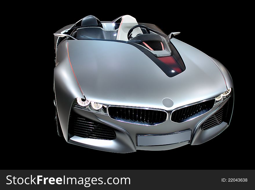 Luxury sport car silver colour isolated on black background. Luxury sport car silver colour isolated on black background