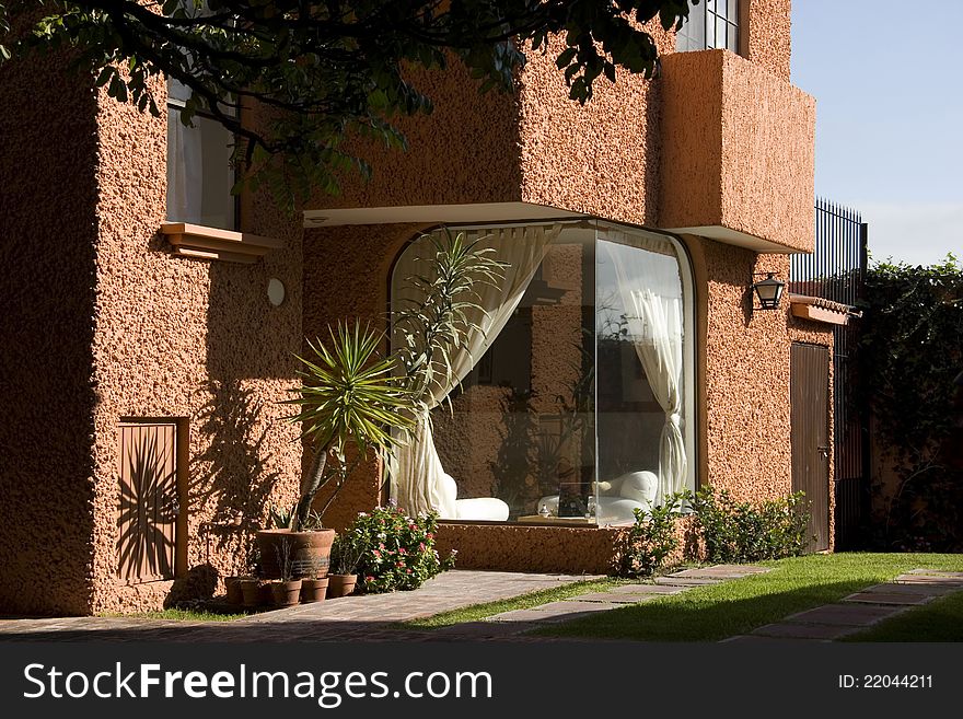 Outdoor view of a house with plants. Outdoor view of a house with plants