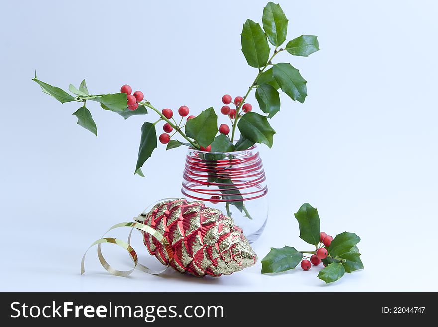 Christmas is coming composition with holly berry on white background. Christmas is coming composition with holly berry on white background.