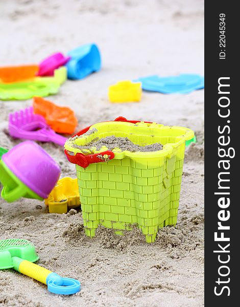 Colorful beach toy's for children on beach. Colorful beach toy's for children on beach