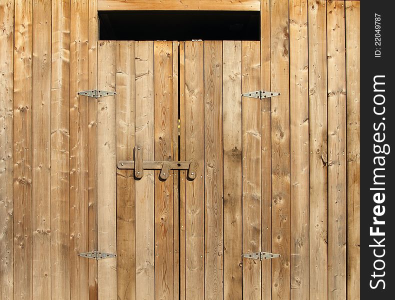 Closeup of an exterior wood door. Closeup of an exterior wood door