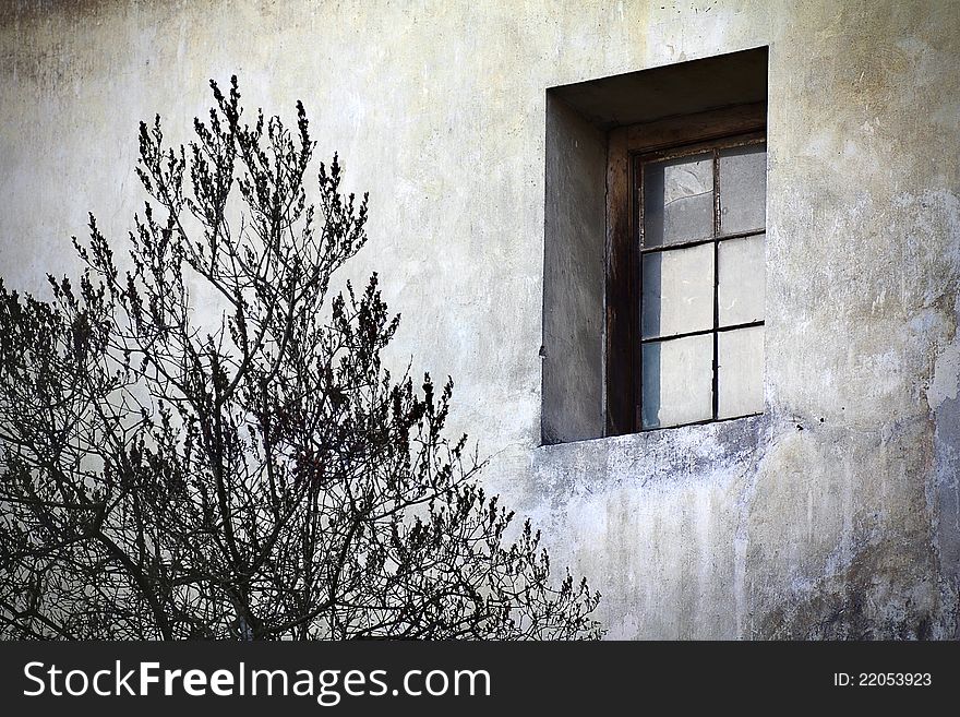 Aged single window and grunge damaged wall. Aged single window and grunge damaged wall