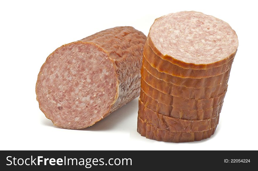 Pieces of salami on white background