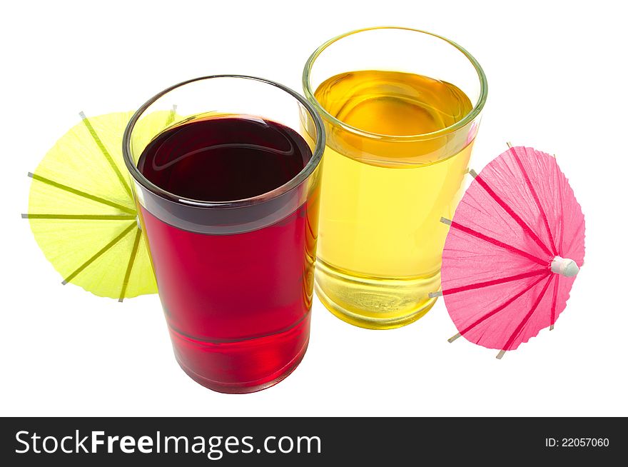 Two glasses of apple and cherry juice isolated on a white background. Two glasses of apple and cherry juice isolated on a white background