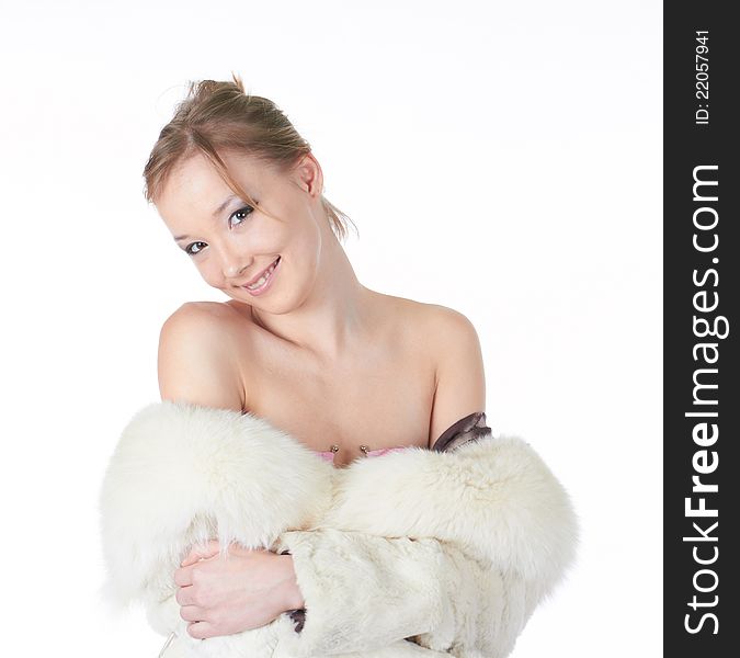 Portrait of attractive young woman smiling over white background