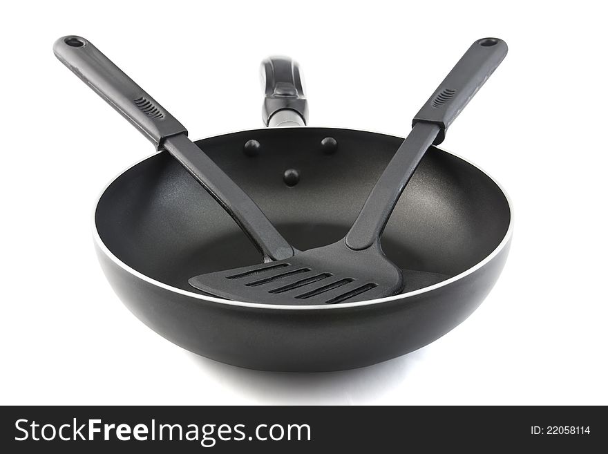 Pan with handle and Spade of frying pan on white background