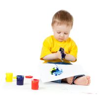 Adorable Dirty Child With Paints Royalty Free Stock Images