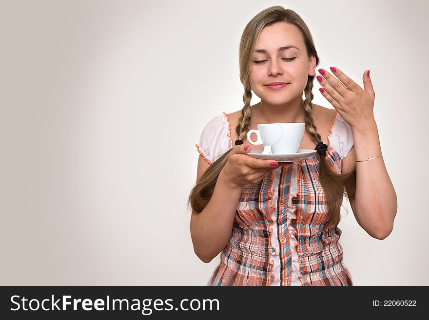 Woman Drinking A Cup Of Tea