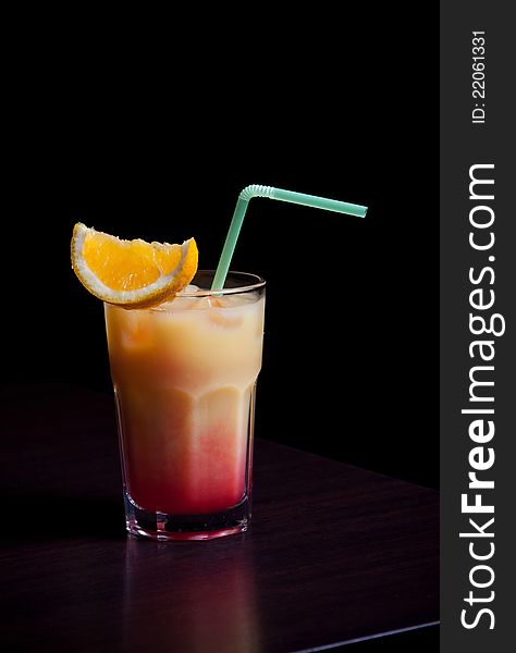 Alcohol drink with fruit and straw. Alcohol drink with fruit and straw