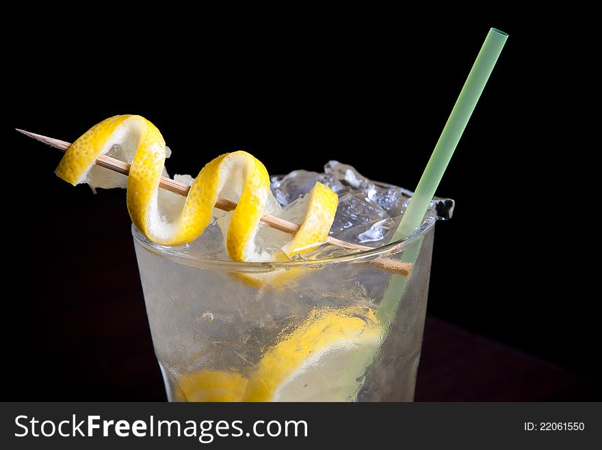 Tropical cocktail glass with fruits