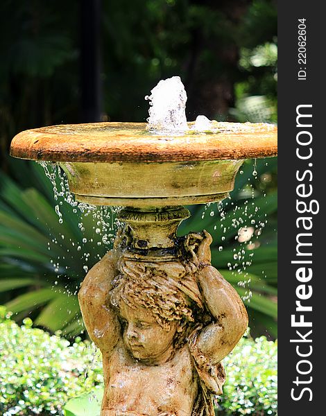 Bubbling Angel Sculpture Fountain In The Garden