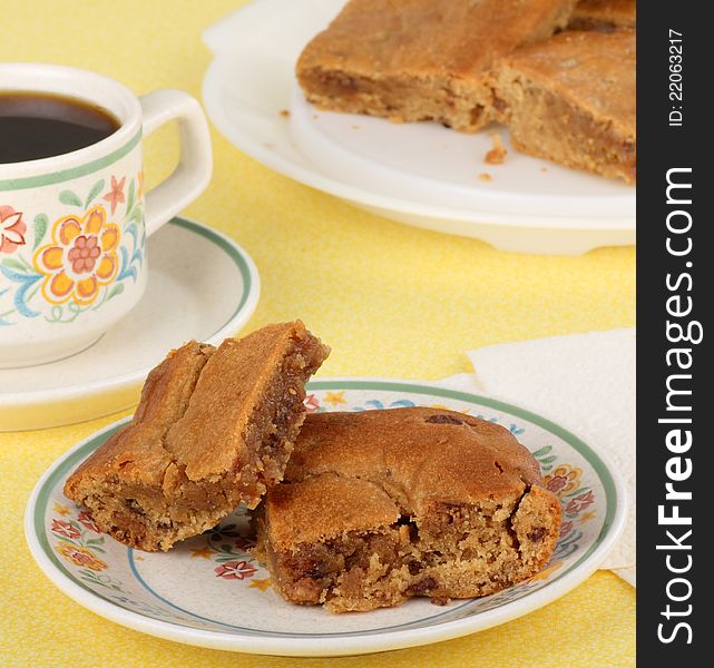 Peanut butter bars with cup of coffee. Peanut butter bars with cup of coffee