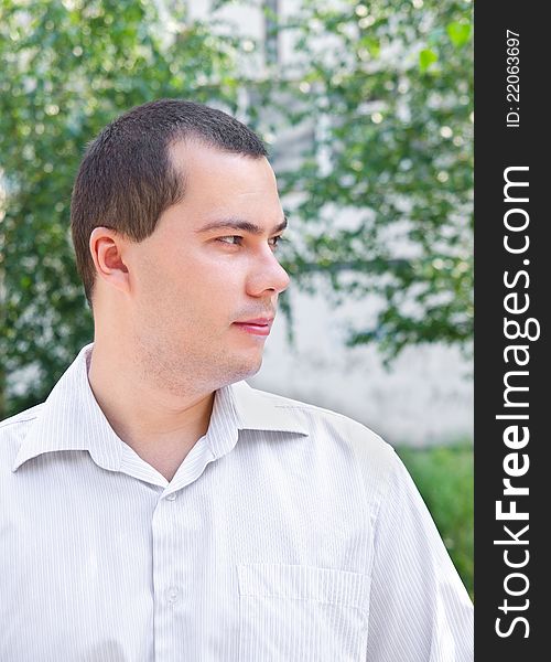 Outdoors portrait of young man in the park. Outdoors portrait of young man in the park