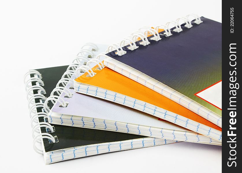 Stack of ring binder book or notebook on white background