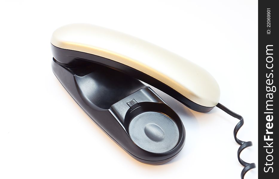 The telephone with half hanging handset