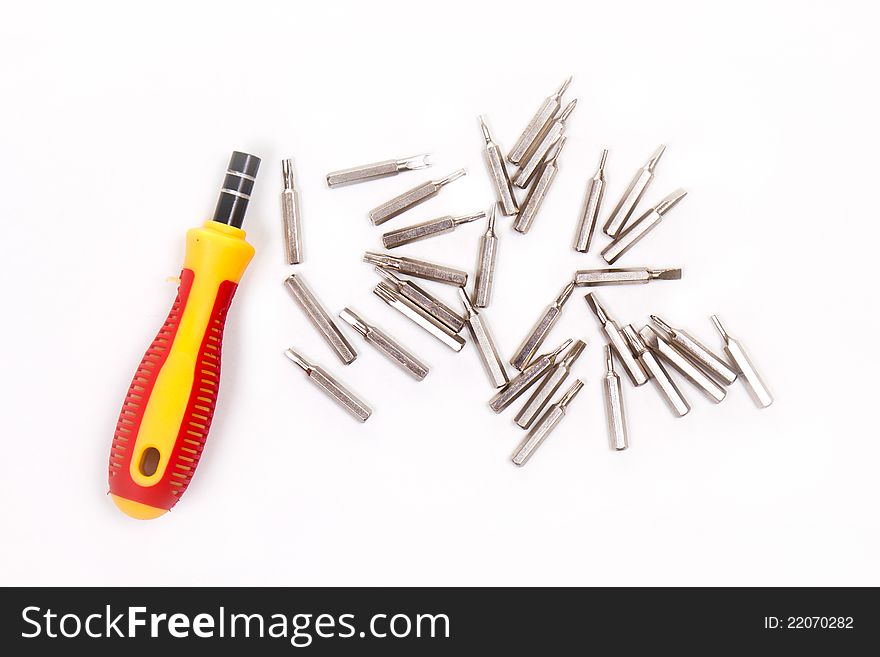 Yellow screwdriver heads toolkit isolated on white