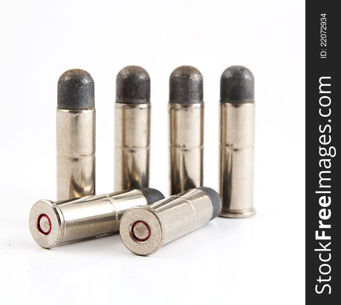 Closeup image of six .38 bullet on white background. Closeup image of six .38 bullet on white background