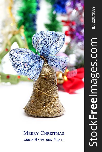 Christmas bell with ribbon on a colorful background. Christmas bell with ribbon on a colorful background