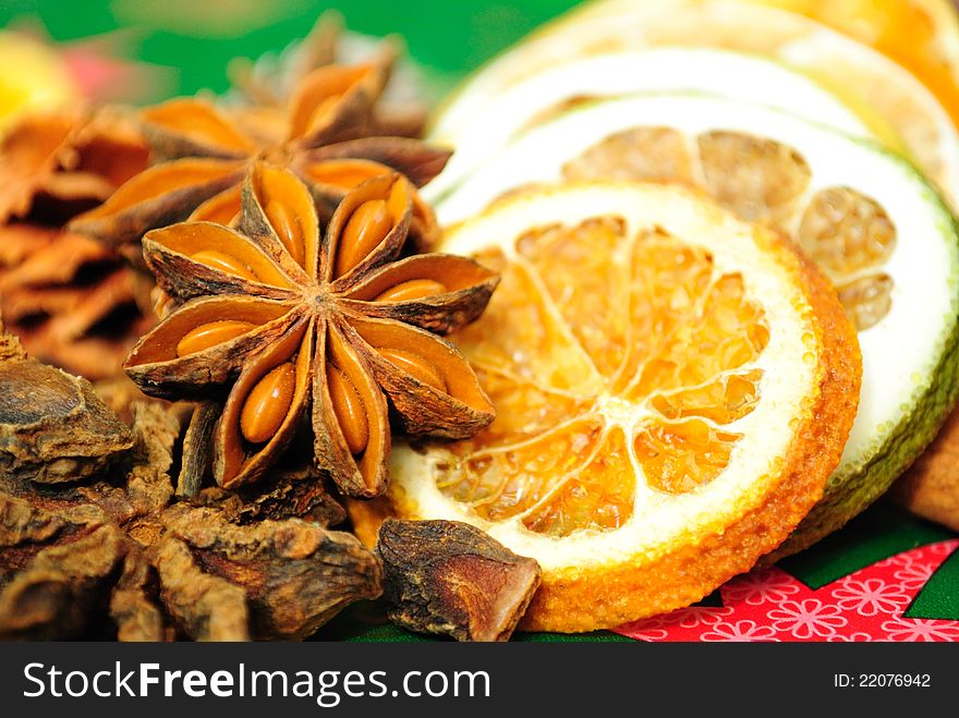 Cinnamon sticks, anise stars and sliced of dried orange. christmas decoration. selective focus. Cinnamon sticks, anise stars and sliced of dried orange. christmas decoration. selective focus