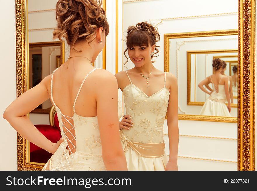 A portrait of a beautiful happy bride indoor