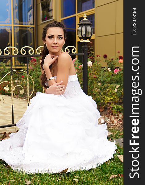 A portrait of a beautiful happy bride outdoor