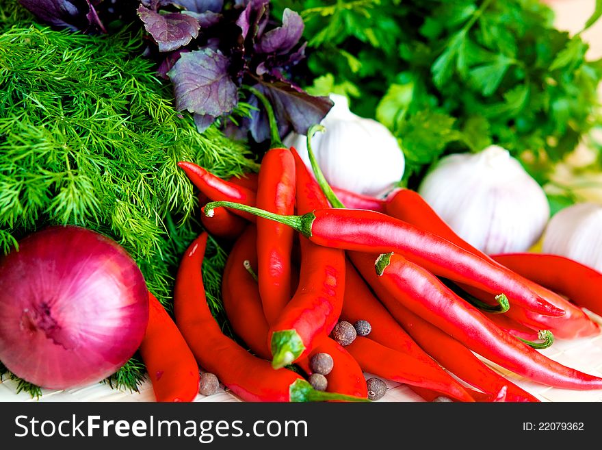 Autumn vegetables, hot peppers, garlic fragrant, fresh greens, red onion,. Autumn vegetables, hot peppers, garlic fragrant, fresh greens, red onion,