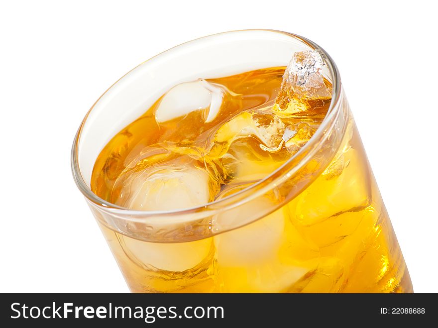 Whiskey with ice cubes. Isolated on white background