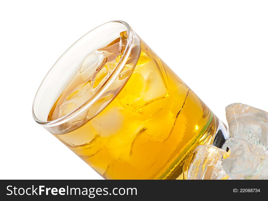 Whiskey with ice cubes. Isolated on white background