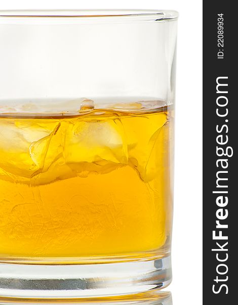 Whiskey with ice cubes. Isolated on white background