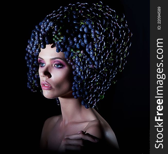 Vintage - lovely girl in fresh ripe vines of grapes on her head - series of photos over black background s. Vintage - lovely girl in fresh ripe vines of grapes on her head - series of photos over black background s