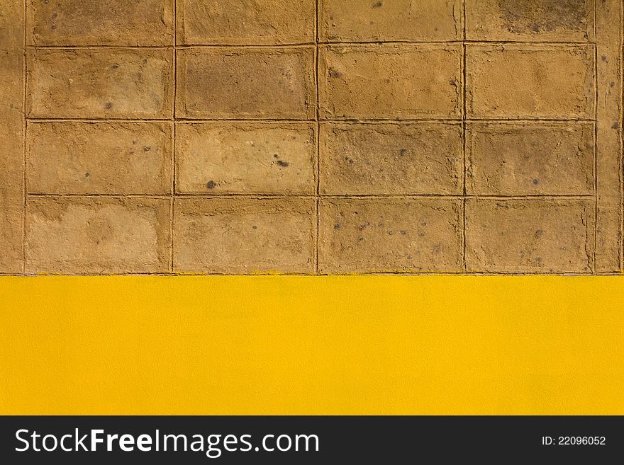 Walls of brown clay. Located on the cement walls are yellow.