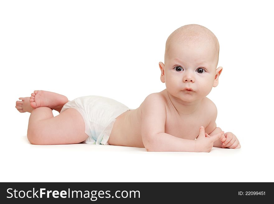Baby boy lying on tummy isolated on white background. Baby boy lying on tummy isolated on white background