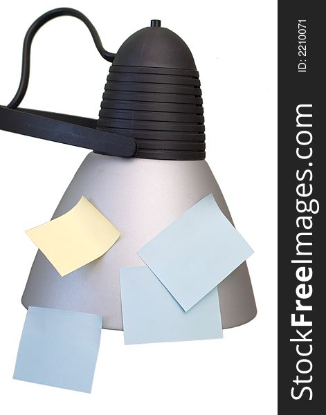 Sticky papers on the reading lamp