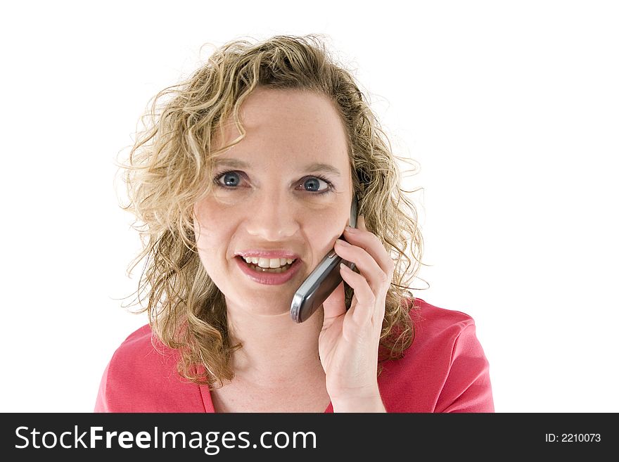 Attractive blonde with a mbile phone isolated on white. Attractive blonde with a mbile phone isolated on white