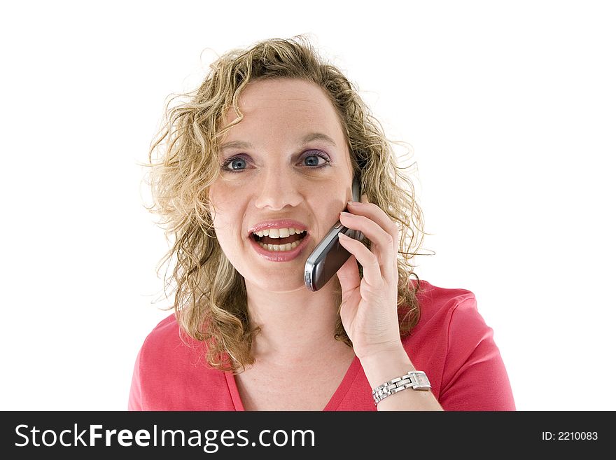 Attractive blonde with a mbile phone isolated on white. Attractive blonde with a mbile phone isolated on white