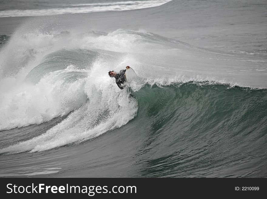 Bodyboarder On Top Of The Wave