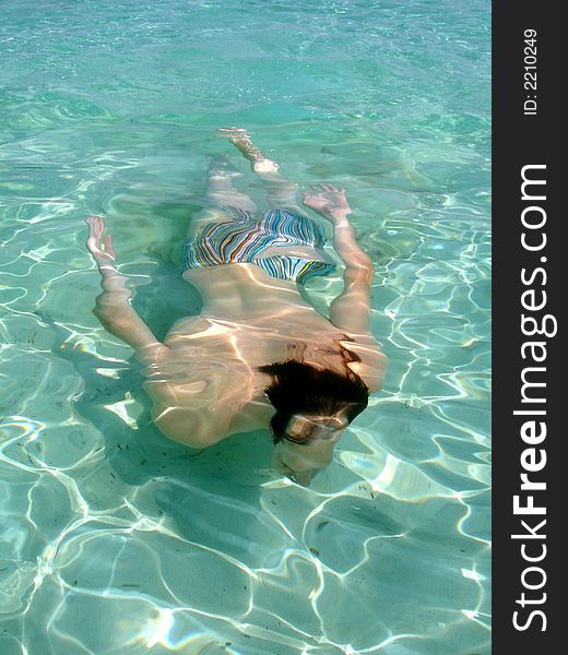 Young man diving in the sea