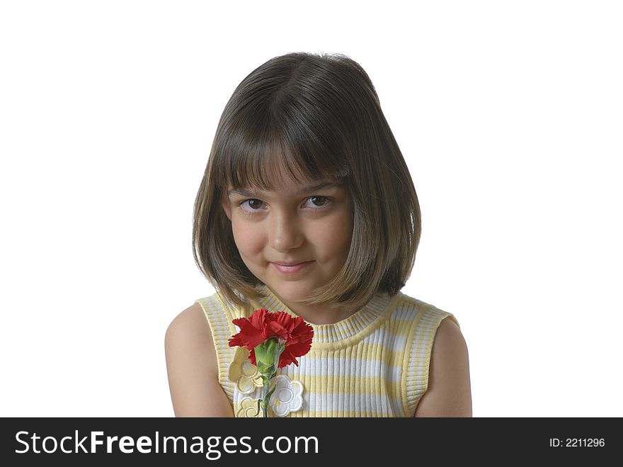 Pretty young girl holds a red carnation. Pretty young girl holds a red carnation