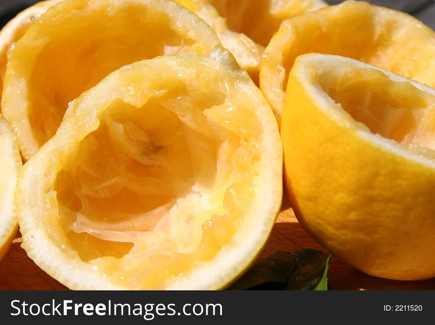 Half lemons squeezed out of juice. Half lemons squeezed out of juice