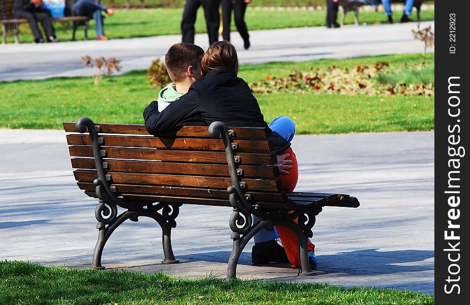 Young Couple On Bench