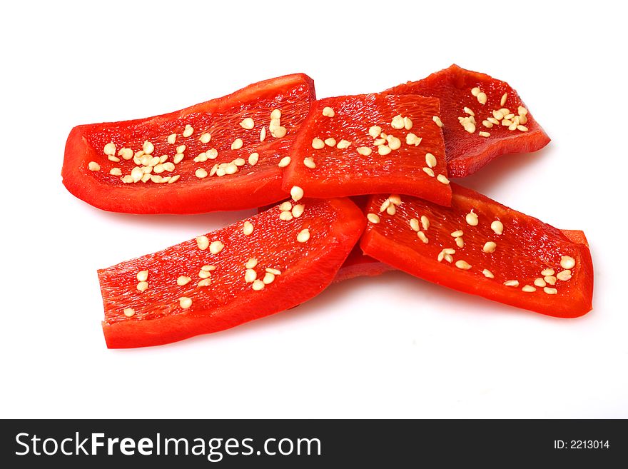 Slices of red bell pepper isolated on white. Slices of red bell pepper isolated on white