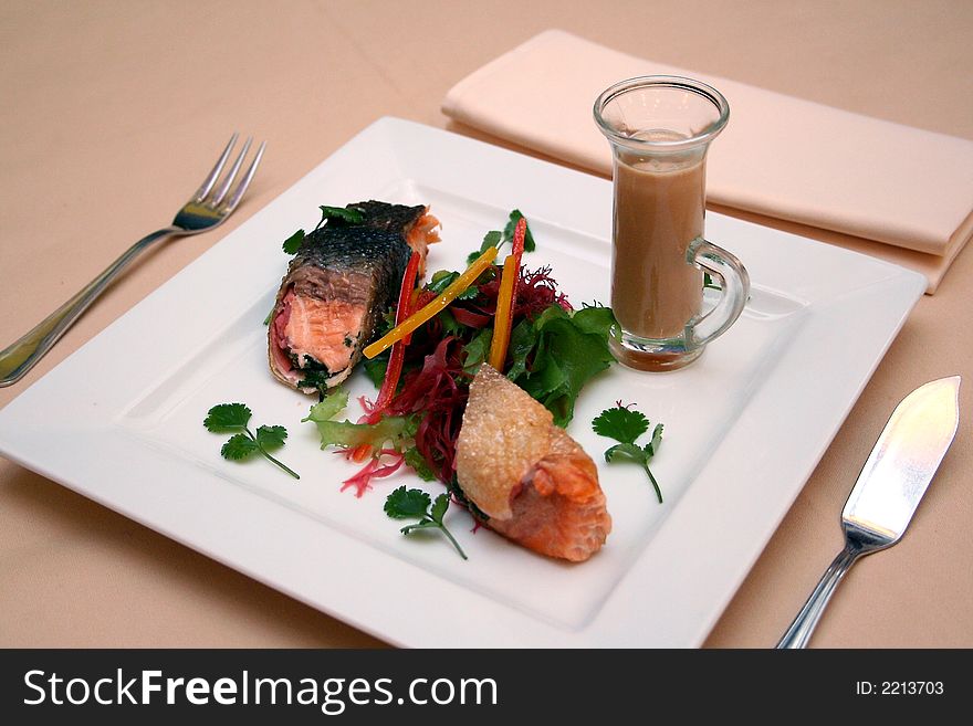 Roasted salmon with sauce and seaweed
