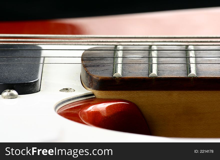 Close up at twenty second fret of an electric guitar. Close up at twenty second fret of an electric guitar