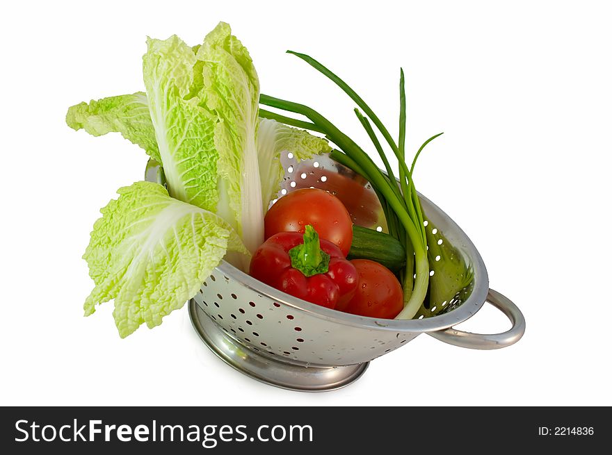 Fresh vegetables for salad in white background