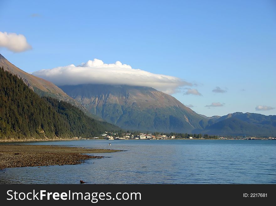 Kenai mountains in Alaska wcovered with a thick cloud. Kenai mountains in Alaska wcovered with a thick cloud